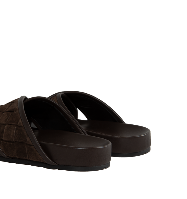 Image 3 of 4 - BLACK - BOTTEGA VENETA Tarik Intrecciato Suede Slide Sandals featuring signature woven intreccio suede with leather piping, flat heel, open toe, crisscross vamp, easy slide style and molded comfort footbed. Made in Italy. 