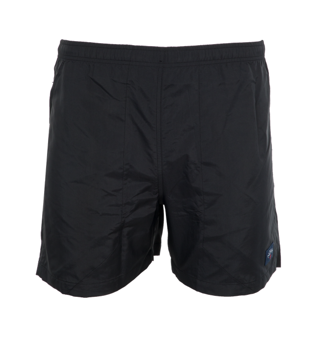 Image 1 of 4 - BLACK - NOAH CORE SWIM TRUNK crafted from 100% nylon with poly mesh liner. Elastic drawstring waist, on-seam front pockets, flap back pocket with snap closure and drain vent.  Ultralight and quick-drying, as high-performing in the water as they are on land. Featuring solid proportions, functional pockets, an essential summer staple. Made in Portugal. 