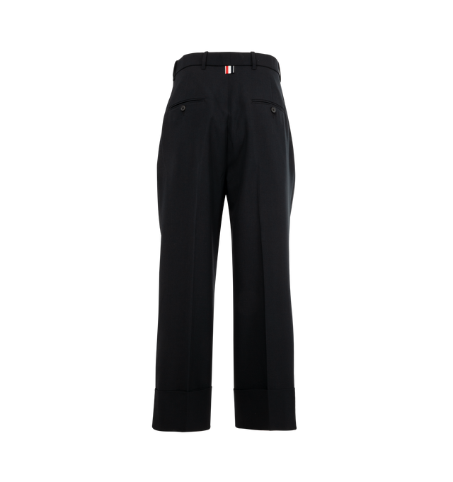 Image 2 of 3 - BLACK - THOM BROWNE School Uniform Plain Weave Trouser featuring double pleat, shortened hem, roomy wide fit, tab front closure, button-fastening back welt pockets, adjustable buttoned backstrap and signature striped grosgrain loop tab. 50% wool, 50% polyester. Lining: 100% cupro. Made in Italy. 