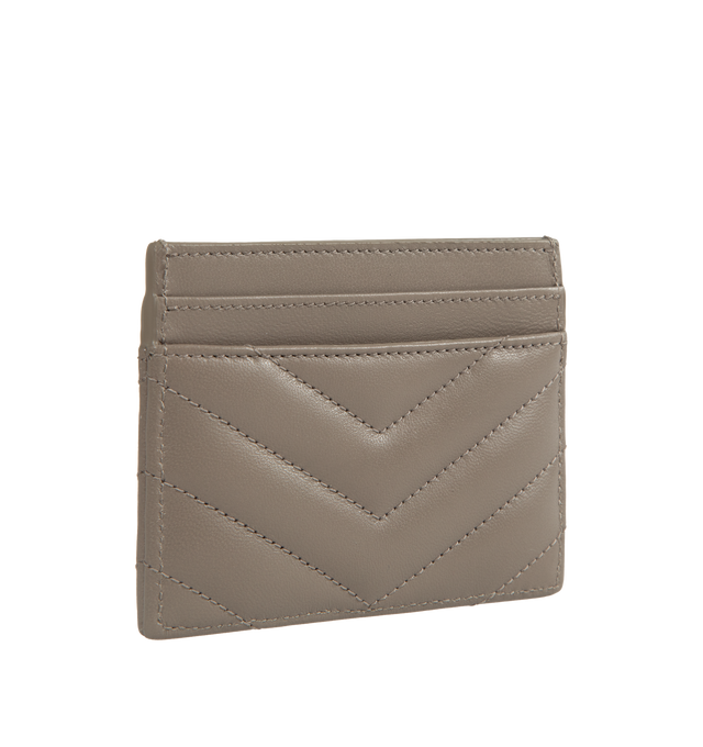 Image 2 of 3 - GREY - SAINT LAURENT Monogram Card Case featuring five card slots, gold tone hardware, cassandre and chevron-quilted overstitching. 4 X 2.8 X 0.1 inches. 100% lambskin. Made in Italy.  