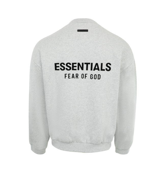 Image 2 of 3 - GREY - Fear of God Essentials Crewneck Sweatshirt crafted from heavy 380gsm core fleece to provide additional body and structure. Featuring signature "Essentials Fear of God" soft-touch logo on the chest and across the back, rib-knit collar, cuffs, and waist-hem and Essentials Fear of God rubberized label at the back collar. 80% cotton / 20% polyester fleece. 