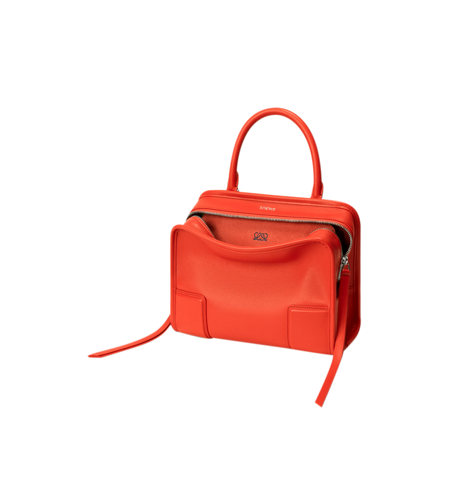 Image 7 of 17 - ORANGE - Loewe Small Amazona 180 Bag in leather features a relaxed silhouette anchored by a single toron top handle, designed to be carried open, while a concealed closure secures the main compartment, three carry options: short handle, removable shoulder strap and crossbody, zip closure with two leather zip pullers, two compartments, main compartment closed with magnetic closure, internal flat pocket, left side d-ring for customization, nappa lambskin lining, and embossed double L branding. 