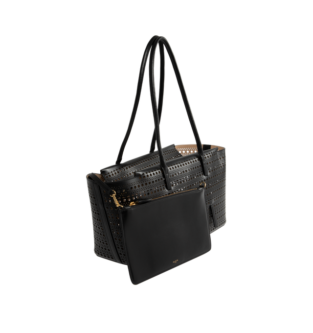 Image 2 of 3 - BLACK - ALAA Medium zipped tote bag in an elongated shape with long handles for shoulder carry and zip closure. Dimensions (cm) : L 32 x H 19 x D 16. 100% CALF LEATHER. Made in Italy. 