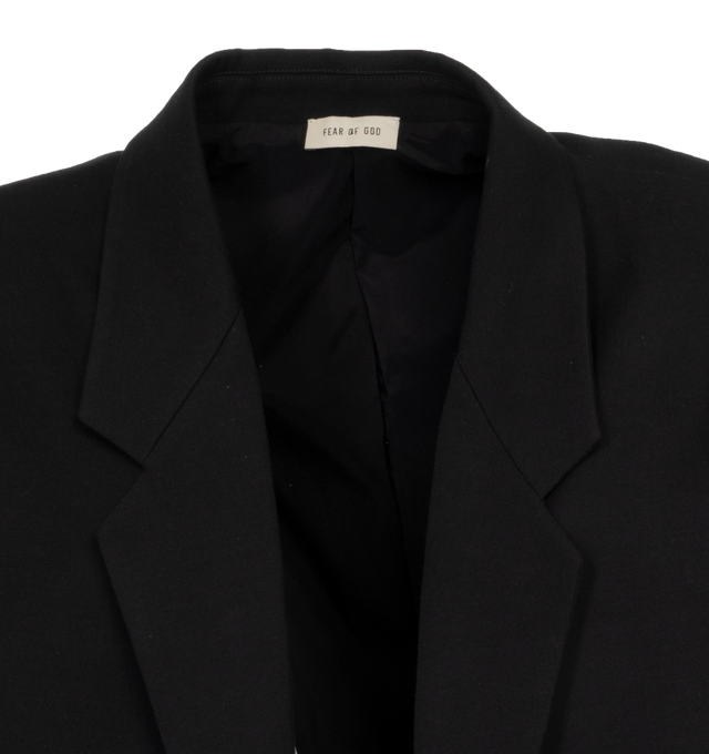 Image 4 of 4 - BLACK - FEAR OF GOD 8th California Blazer featuring single-breasted, cropped, round silhouette with a relaxed fit in the body and sleeves, iridescent cupro lining, no closure and leather Fear of God label is stitched at the back collar. 100% virgin wool. 