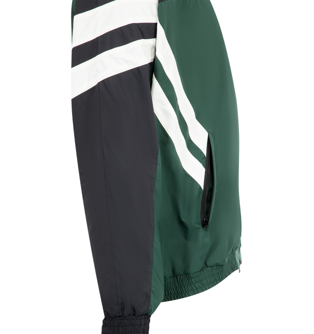Image 3 of 3 - GREEN - VETEMENTS Track Jacket featuring technical jersey, colour-block design, front two-way zip fastening, mock neck, drop shoulder, long sleeves, stripe detailing, embroidered logo at the chest, two side welt pockets, embroidered logo to the rear and elasticated hem. 100% polyester. 