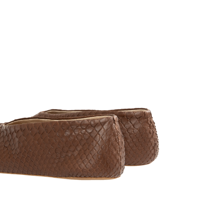 Image 3 of 4 - BROWN - The Row mousse brown slip-on flat with an oval toe, center front seam, and a flexible rubber-coated sole in textured python leather. Python leather with goat leather lining and rubber sole. Made in Italy. 