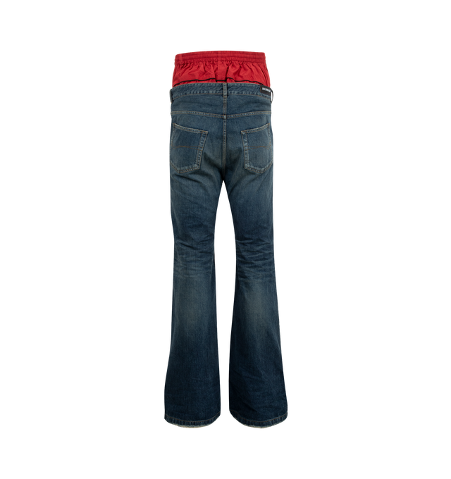 Image 2 of 3 - BLUE - Balenciaga Layered Jeans are a 5-pocket style with a modern layered design, a front button and zip fastening, and belt loops. 100% cotton.  