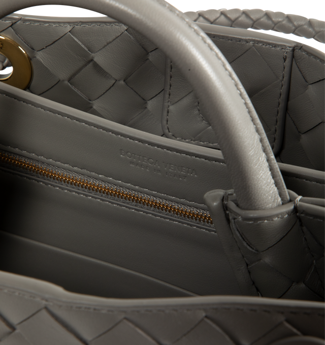 Image 4 of 4 - GREY - Bottega Veneta small Andiamo handbag featuring intrecciato leather with leather top handle, sliding cross-body strap, compartmented interior with one zippered pocket, two open pockets and magnetic closure. 7.9" x 9.8" x 3.9". 100% lambskin. Made in Italy. 