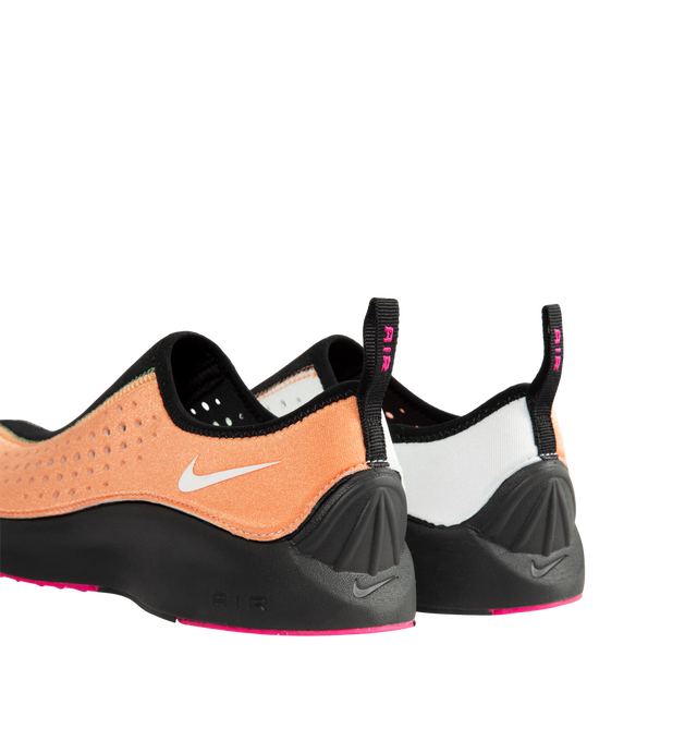 Image 3 of 5 - ORANGE - Nike Women's Air Superfly Slip Neo SP Shoes feature a streamlined, laceless version of the iconic Superfly silhouette, designed for effortless comfort and a sleek modern look. Crafted with a stretchy textile upper, this lightweight style provides a soft, supportive fit, while enlarged ventilation perforations enhance breathability. Finished with Nike Air cushioning for responsive comfort, a foam midsole, and a durable rubber outsole for everyday wear. Main Material: Textile Upper. Cu 