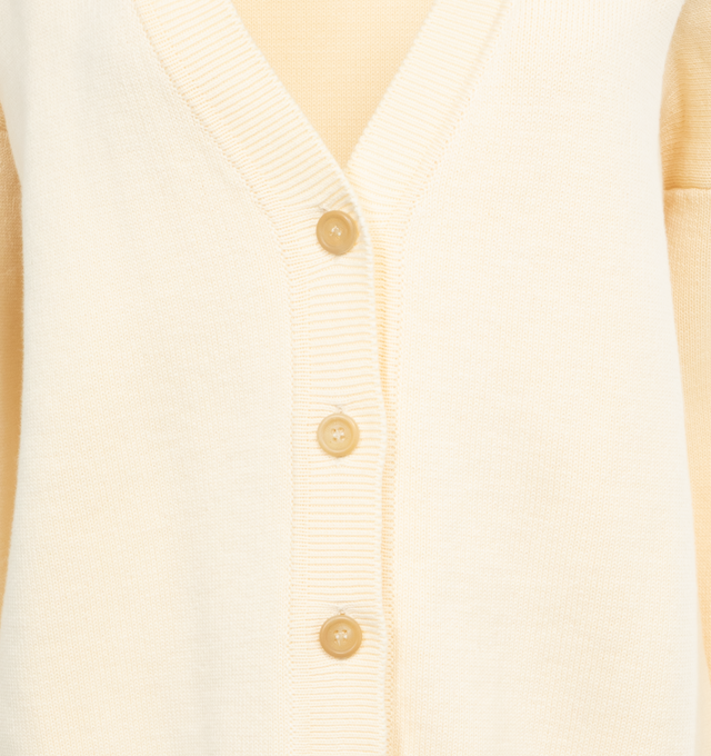 Image 3 of 3 - WHITE - ARMARIUM Ivan Knitted Cardigan featuring long sleeves, v-neck and button front closure. 100% cotton.  