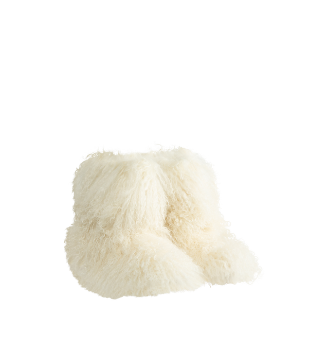 Image 2 of 4 - WHITE - UGG Women's Classic Short Fluff Momma Boot is crafted from long sheepskin and features a statement short-boot silhouette, an 8-inch shaft, and a rear pull tab. Designed with plush UGGplush lining and sockliner for comfort and warmth, this style is finished with a lightweight sugarcane EVA outsole and recycled polyester textile binding. Main Material: Long Sheepskin. Vamp Lining: 17mm UGGplush (60% Upcycled Wool, 40% TENCEL Lyocell). Shaft Lining: Textile. Sockliner: 17mm UGGplush (60% 