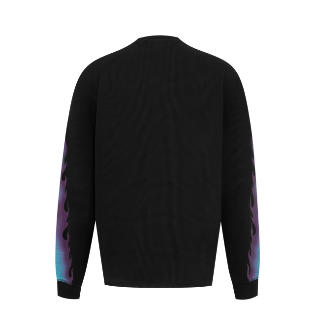 Image 2 of 2 - BLACK - Market Men's Through the Flames Thermal Long Sleeve Shirt is crafted from a soft cotton-blend thermal knit and features a classic crew neckline, long sleeves, and seasonal Through the Flames graphic artwork for a bold statement look. This designer thermal shirt combines textured everyday comfort with Market's signature contemporary streetwear aesthetic, making it an elevated layering essential for cooler weather. Main Material: Cotton Blend Thermal Knit. 52% Cotton; 48% Polyester. 