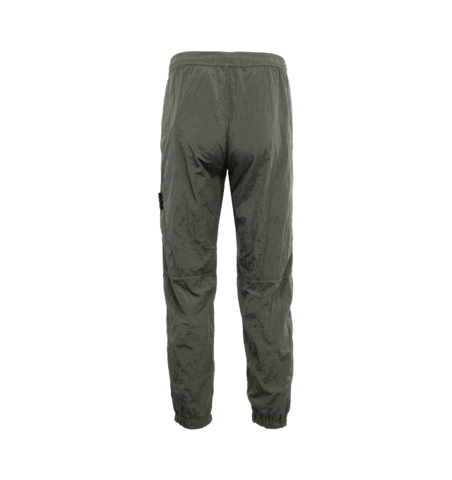 Image 2 of 3 - GREEN - Stone Island Pantalone Regular Trousers have a tapered style with elastic cuffs and an elastic waist.  