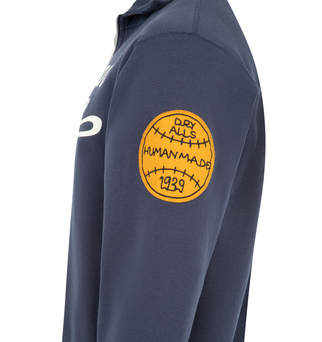 Image 3 of 3 - BLUE - HUMAN MADE  Half Zip Logo Sweatshirt featuring soft fleece fabric, classic collar, half zip closure, sleeve patch detail and patch & printed branding. 100% cotton. 