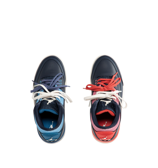Image 5 of 5 - NAVY - Jordan Women's Air Jordan 3 Retro "Sport Renaissance" Sneakers feature an Obsidian, Track Red, and Chalk upper crafted from leather and synthetic leather. The classic silhouette is finished with a foam midsole, visible Max Air cushioning, and a rubber outsole. Upper: Leather and Synthetic Leather. Midsole: Foam. Sole: Rubber. 