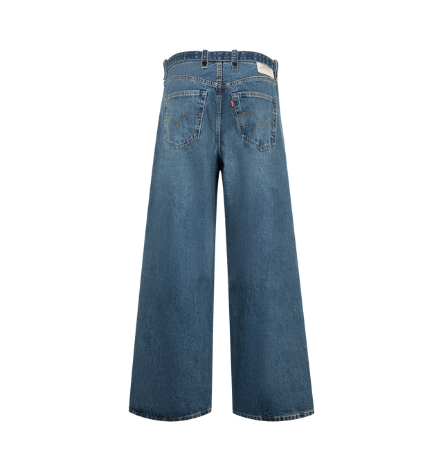 Image 2 of 5 - BLUE - Sacai X Levi's Men's Belted Wide leg pants are crafted from a medium-dark wash cotton denim and feature a high-rise waist, wide-leg silhouette, a buckled belt, signature Levi back-pocket design, and utility-inspired patch pockets. Main Material: 100% Cotton. Made in Japan. 
