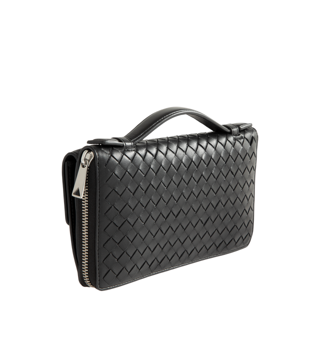 Image 2 of 3 - BLACK - Bottega Veneta Mens Zip-Around Organizer is crafted from Intrecciato piccolo calfskin leather. Features a zip-around closure, six card slots, two bill compartments, one coin pocket, one exterior pocket, calfskin lining, and silver-finish hardware. Main Material: Calfskin Leather; Lining: Calfskin Leather. Made in Italy. 