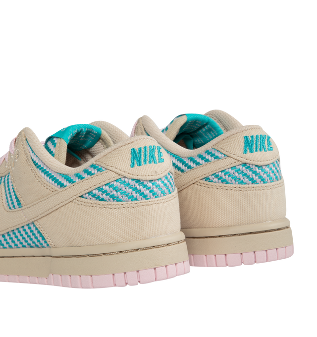 Image 3 of 5 - MULTI - Nike Dunk Low Sneakers with Sand Drift and Dusty Cactus color-blocking, signature swoosh,  a padded, low-cut collar, leather upper with a slight sheen and durability, foam midsole offering lightweight, responsive cushioning. Perforations on the toe add breathability. Rubber sole with classic hoops pivot circle provides durability and traction. 