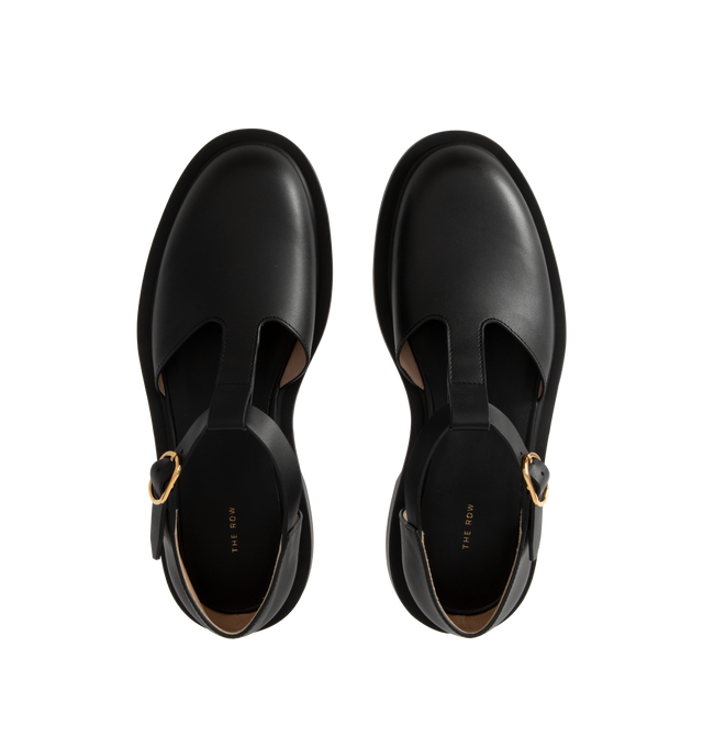 Image 4 of 4 - BLACK - THE ROW Nic T-Strap Flat featuring adjustable buckle closure, t strap and square toe. Leather upper and rubber sole. Made in Italy. 