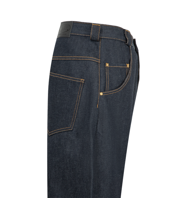 Image 3 of 3 - NAVY - The Bad Boy Jean is cut in a baggy, oversized silhouette with a low waist and dropped crotch. Designed with an extra-long, wide leg that creates a stacked, exaggerated shape, it delivers a bold, expressive proportion. Finished with a gold button fly, signature W belt loops with a key loop, and a leather WILLY patch for distinctive detail. Main Material: Cotton. 