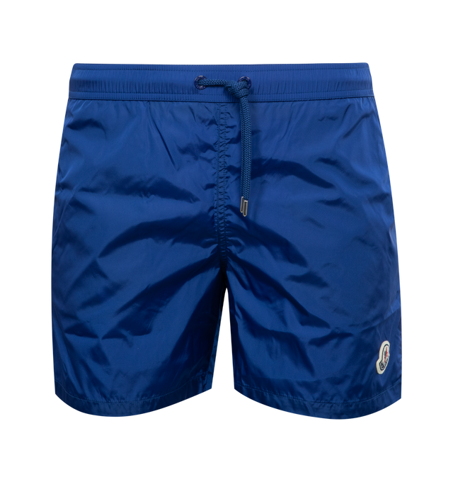 Image 1 of 3 - BLUE - MONCLER Swim Shorts featuring waistband with drawstring fastening, side pockets, zipped back pocket and silicone logo patch. 100% polyamide/nylon. 