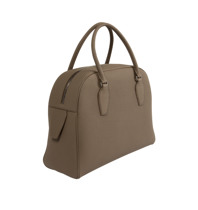 Image 2 of 3 - BROWN - The Row India 12.00 bowling bag in matte grained calfskin leather with tubular handles, branded metal padlock and key, 1 interior zipped pocket, 1 slot pocket and zipper closure. Measures 12 x 9.5 x 12 in. with 4.75 in. handle drop. 100% calfskin leather lined in 100% lambskin leather. Made in Italy. 