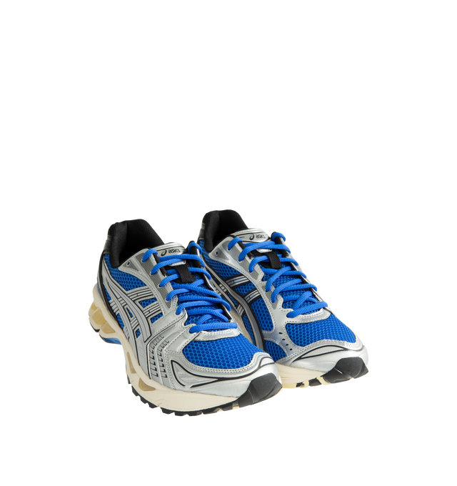 Image 2 of 5 - BLUE - Asics GEL-Kayano 14 Sneakers are lace-up style with rip-stop underlays, GEL cushioning, and TRUSSTIC support system. Unisex style in men's sizing. Imported from Indonesia. 