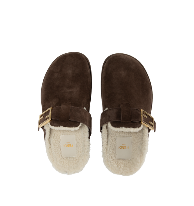 Image 4 of 4 - BROWN - FENDI Feel Mules featuring round-toed sabots with FF strap, suede, finished with white sheepskin interior and gold-finish metalware. Made in Italy. 