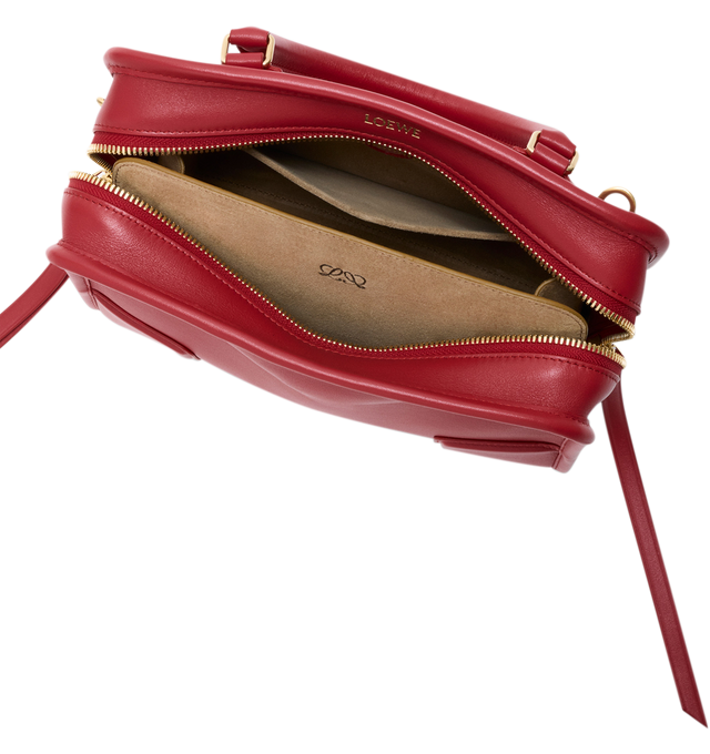 Image 12 of 18 - RED - Loewe Small Amazona 180 Bag in leather features a relaxed silhouette anchored by a single toron top handle, designed to be carried open, while a concealed closure secures the main compartment, three carry options: short handle, removable shoulder strap and crossbody, zip closure with two leather zip pullers, two compartments, main compartment closed with magnetic closure, internal flat pocket, left side d-ring for customization, nappa lambskin lining, and embossed double L branding. L 