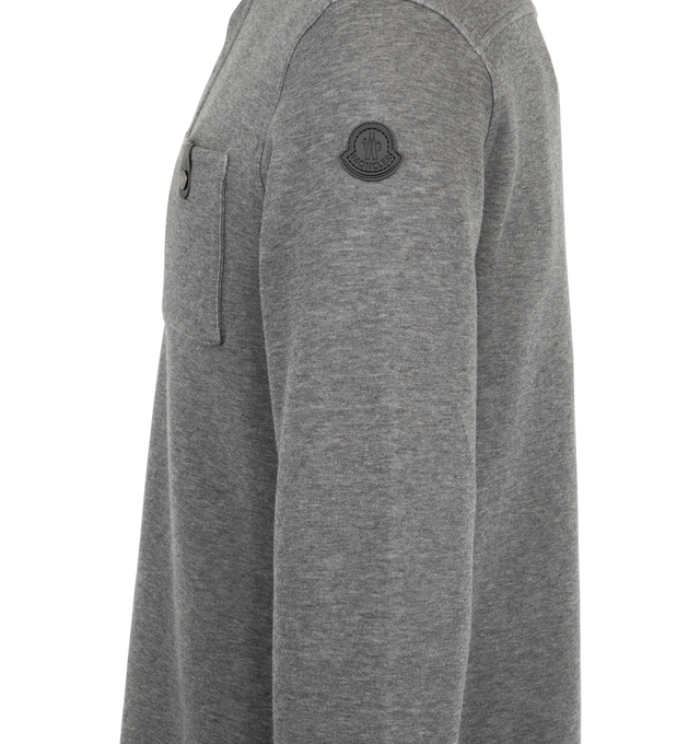 Image 3 of 3 - GREY - Moncler Men's Cotton Long Sleeve Polo Shirt is crafted from a cotton blend and features a relaxed silhouette with a polo collar and snap-button closure. Designed in a loose fit, this long-sleeve style is detailed with a chest pocket accented by a leather button tab, elastic cuffs, and a leather logo patch. Main Material: Cotton Blend 66% Cotton, 34% Polyamide / Nylon. 