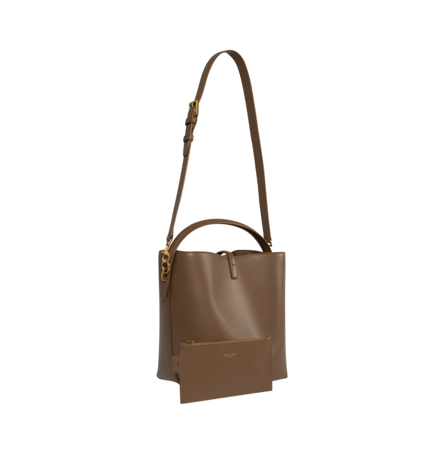 Image 2 of 3 - BROWN - SAINT LAURENT Le 37 Bucket Bag featuring metal cassandre hook closure, one zipped pouch, suede lining, and four metal feet. 20 X 25 X 16cm. Handle drop: 9cm. Strap drop: 40cm. 100% calfskin leather. Made in Italy.  