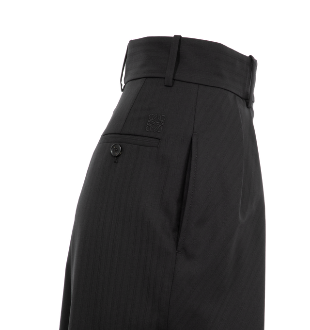 Image 3 of 3 - BLACK - LOEWE Wrap Trousers featuring regular fit, long length, high waist, loose leg, low crotch, asymmetric construction with wrap front, concealed zip fastening, seam pockets, buttoned rear welt pocket, horn button and Anagram embroidery placed at the back. 100% wool. 