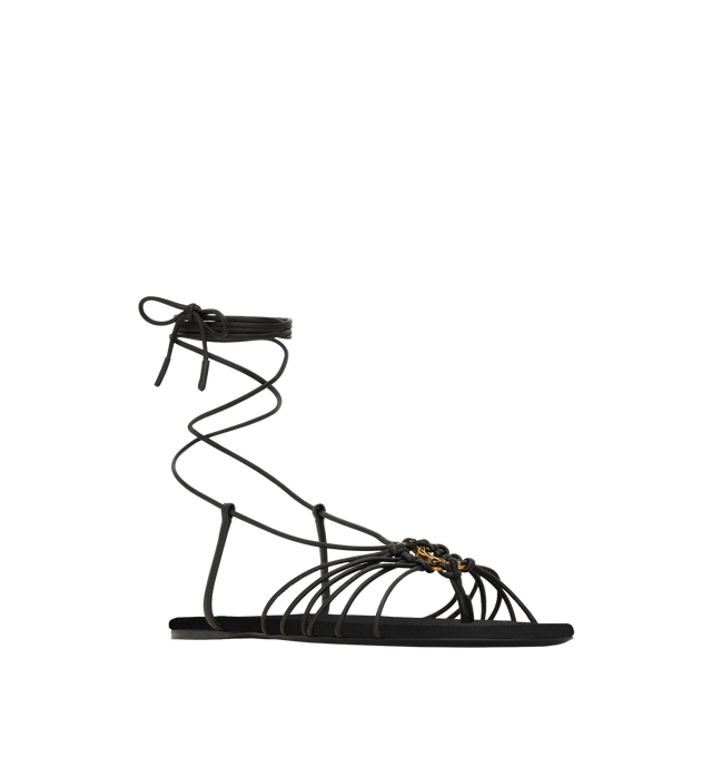 Image 2 of 3 - BLACK - SAINT LAURENT Babylone sandals featuring flat sandals decorated with the cassandrew, an almond toe, lace-up ankle straps, round saint laurent-engraved metal plaque on the insole, satin insole and leather sole. Lambskin, metal. Made in Italy. 