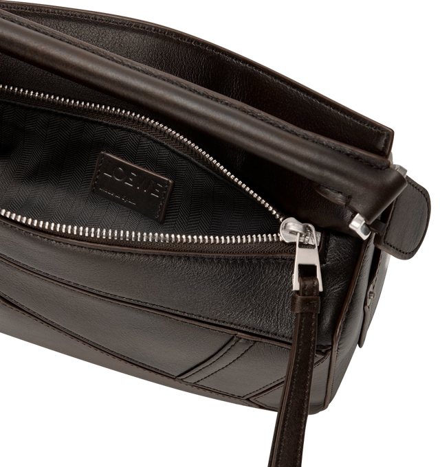 Image 4 of 4 - BROWN - LOEWE Panta Small Puzzle Bag featuring distinctive geometric lines and cuboid form. This small version is crafted in shiny calfskin with denim trousers-inspired details, shoulder, crossbody or hand carry, detachable and adjustable strap, zip closure with calfskin pull, one external rear pocket, one internal slip pocket, herringbone cotton canvas lining and embossed Anagram. Shiny calf. 16.5 cm x 24 cm x 10.5 cm. Made in Spain. 