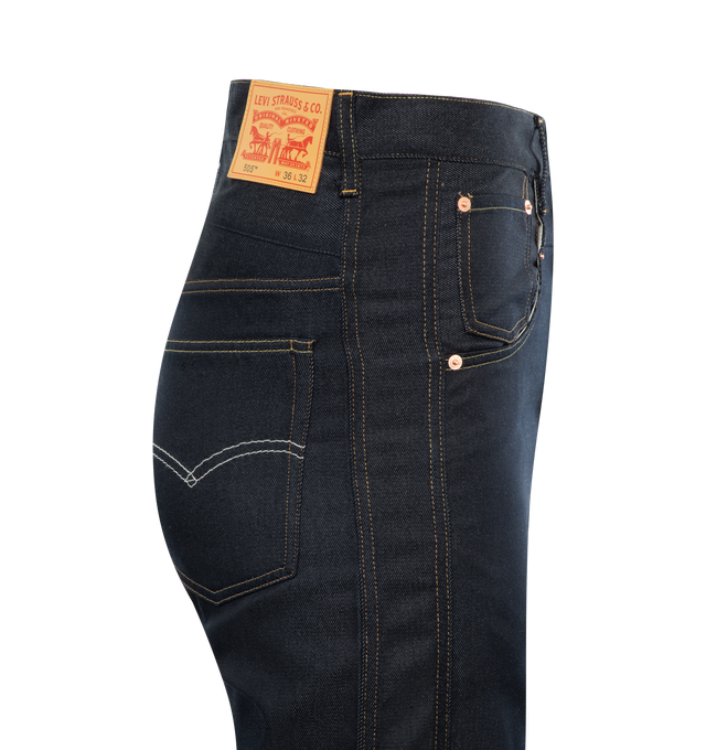 Image 3 of 3 - NAVY - JUNYA WATANABE X LEVI'S Jeans featuring 5-pocket jeans, leather patch at back and belt loops at waist. 100% cotton. Made in Japan. 