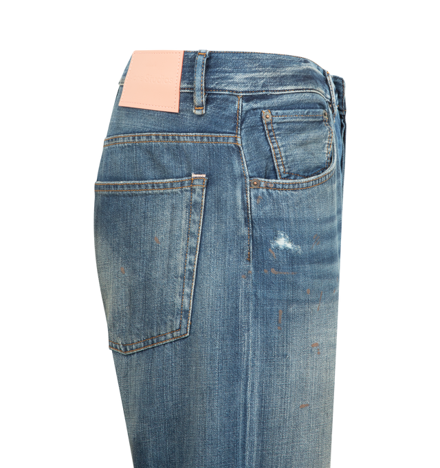 Image 3 of 3 - BLUE - ACNE STUDIOS Jeans featuring regular fit, mid waist, wide straight leg with a slight flare, long length, paint marks, holes, and dirt effects. 100% cotton.  