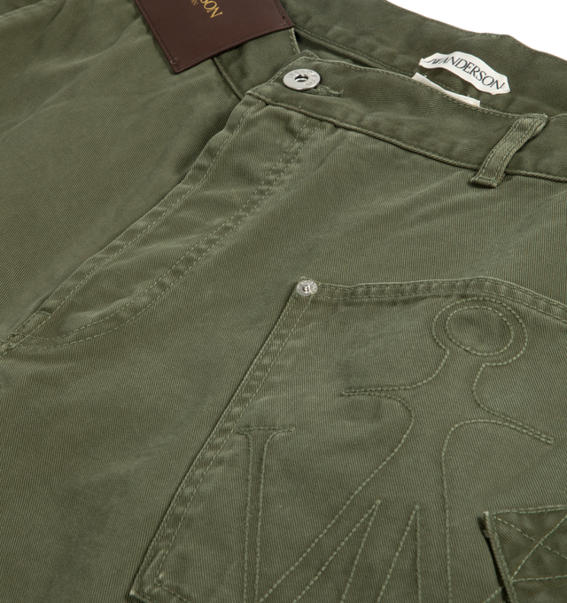 Image 2 of 2 - GREEN - JW ANDERSON Twisted Workwear Jeans featuring large leather logo patch, regular rise, four-pocket style, carpenter loop, anchor stitched left front pocket, relaxed fit through wide legs, button-zip front and belt loops. Cotton. Made in Japan. 