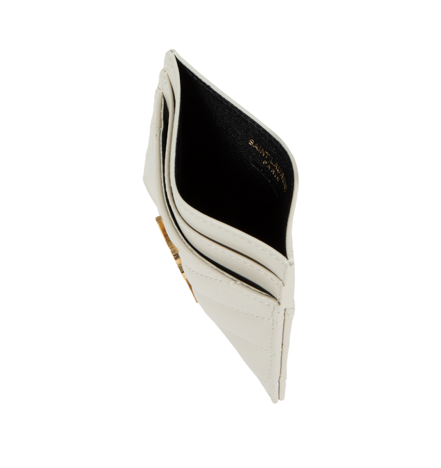 WHITE - SAINT LAURENT Monogram Card Case featuring five card slots, gold tone hardware,the cassandre and chevron-quilted overstitching. 4 X 2.8 X 0.1 inches. 100% lambskin. Made in Italy. 