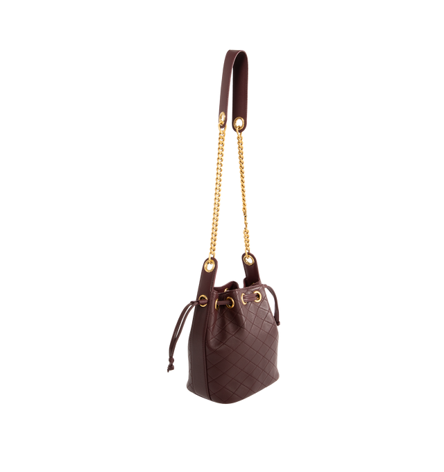 Image 2 of 3 - RED - SAINT LAURENT Chain Bucket Bag in quilted lambskin featuring a jewelry chain strap for shoulder carry, leather lining, bronze-tone hardware and drawstring closure. 6.3" x 7.1" x 3.9". Strap drop: 15.7". Lambskin. Made in Italy. 