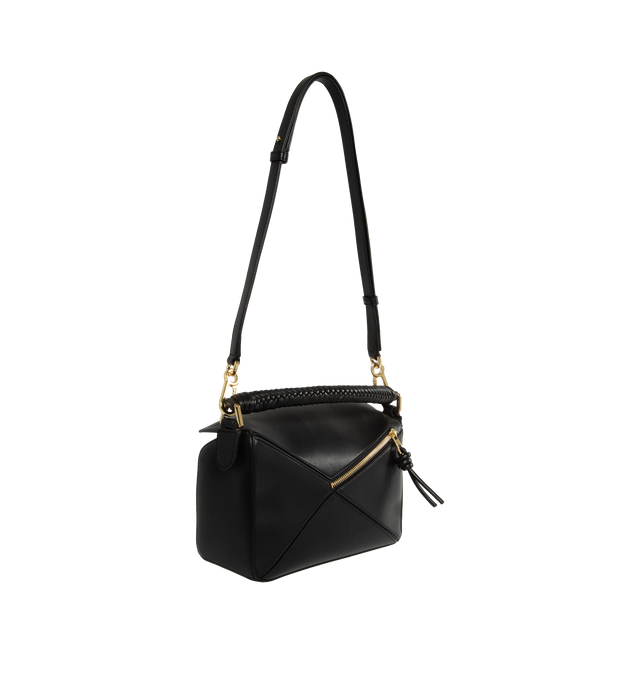 Image 2 of 3 - BLACK - LOEWE Small Puzzle Leather Top-Handle Bag featuring top handle, puzzle pattern leather, woven top handle, detachable shoulder strap, can be worn as a top handle or shoulder bag, fold-over flap top with zip closure, exterior back zip pocket and interior one slip pocket. 6.4"H x 9.4"W x 4.1"D. Made in Spain. 