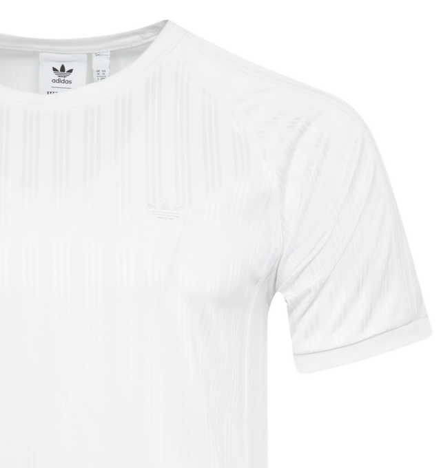 Image 2 of 2 - WHITE - ADIDAS JJJJound Jersey featuring slim fit, 3-striped pattern self, raglan sleeves with tonal 3 stripes, JJJJound & Adidas trefoil embroidery and custom tonal debossed tongue. 100% polyester. 