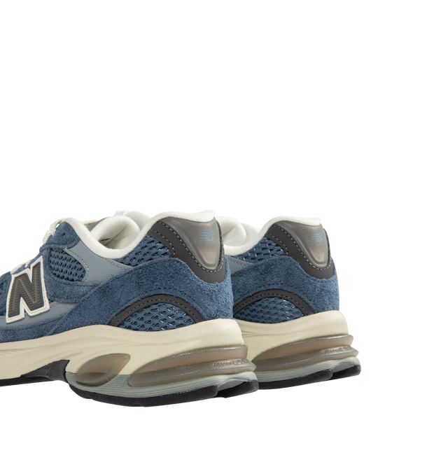 Image 3 of 5 - BLUE - NEW BALANCE 2010 Sneaker featuring ABZORB midsole with ABZORB SBS at the heel and forefoot, Translucent TPU Stability Web shank at midfoot, dculpted midsole details, reflective accents and molded 'N' logo. 
