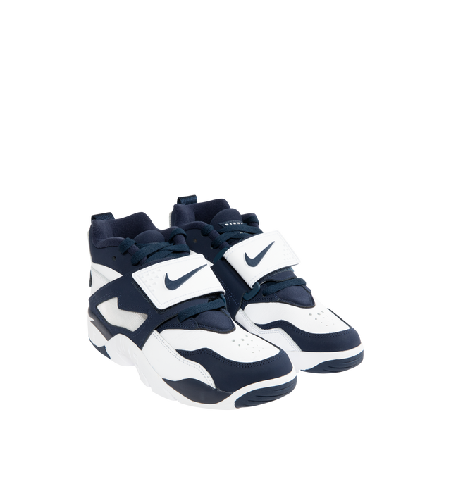 Image 2 of 5 - NAVY - NIKE Air Diamond Turf Sneaker featuring Air units in the heel and forefoot, durable leather, a midfoot strap for a secure fit, leather upper with mesh panels and rubber outsole. 