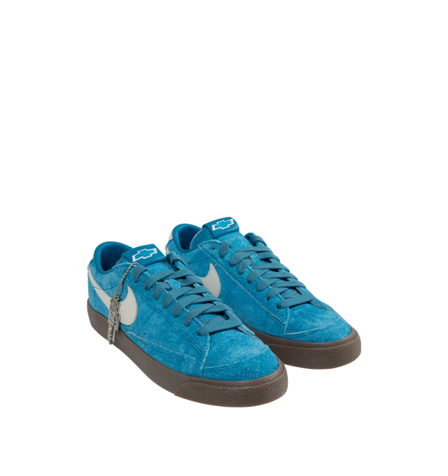 Image 2 of 5 - BLUE - NIKE Blazer Low Devin Booker Chevrolet Team Sneaker featuring supple leather upper in a vibrant hue, signature Booker details, including his jersey number on the heel, low-top silhouette, foam midsole and rubber outsole. 