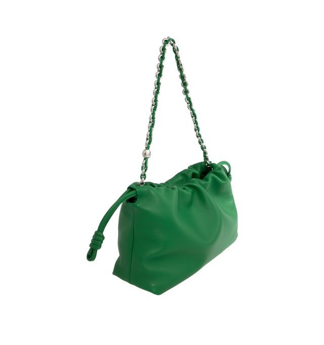 Image 2 of 4 - GREEN - LOEWE Flamenco Purse crafted in mellow nappa lambskin in a ruched design featuring knots at the sides, magnetic closure and detachable donut chain. Versatile and functional, it can be carried as a clutch, worn over the shoulder using the donut chain or crossbody with the accompanying leather strap.  Nappa leather with suede lining. Height 7.9" X Width 11.8" X Depth 4.1". Adjustable Strap length (inches) 37" to 47". Made in Spain. 