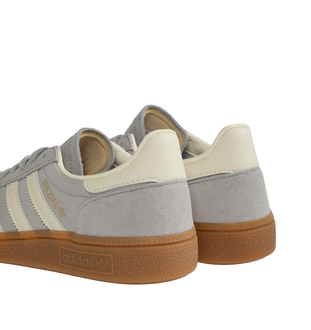 Image 3 of 5 - GREY - Adidas Originals Handball Spezial lace-up sneakers with premium smooth silver-color suede and leather upper featuring off-white tri-stripes, Spezial tongue logo, metallic signature on the side and gum rubber outsole. 