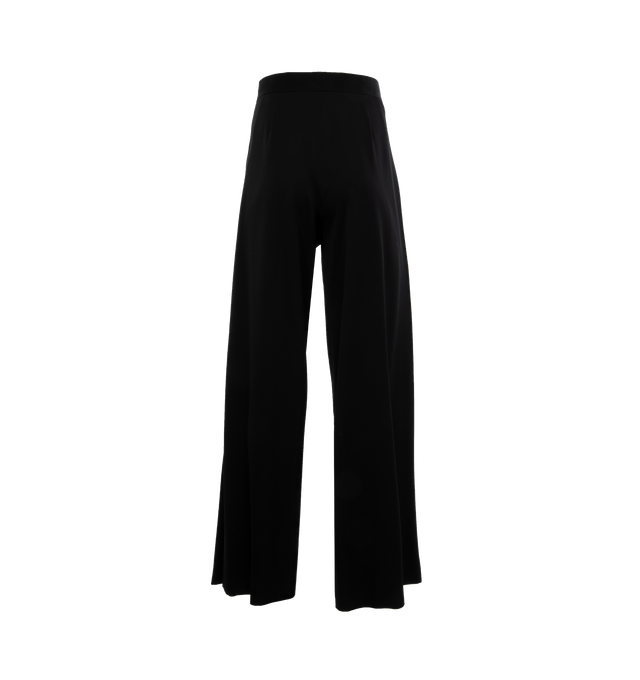 Image 2 of 4 - BLACK - THE ROW Paras Pant featuring a mid-rise tailored pant in fine wool gabardine with wide leg, voluminous side pleats, and side seam pockets. 100% wool. Silk lining. Made in Italy. 