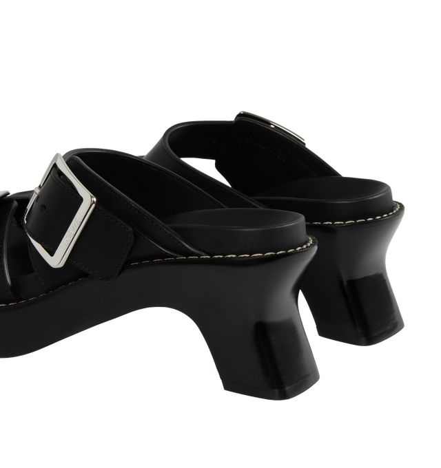 Image 3 of 4 - BLACK - LOEWE Ease Heel Slide featuring two adjustable straps with oversized LOEWE buckles, architectural slanted heel complemented by the "Ease" ergonomic fussbet and contrast stitching. 90mm heel. Vegetal calf. Made in Italy. 