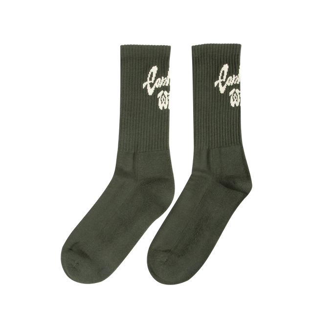 Image 2 of 3 - GREEN - CARHARTT WIP Chedda Socks featuring soft stretch-cotton yarn, rib-knit ankles, french terry panels on the inside of the soles and ajacquard graphic on the back of each sock. 82% cotton, 16% polyester, 2% elastane. 