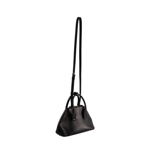 Image 2 of 3 - BLACK - The Row Devon compact structured top handle bag in polished saddle leather with top zipper closure, hidden shoulder strap, and decorative stitching detail. Measures 9.25 x 4.75 x 8 in. 100% Calfskin Leather. Made in Italy. 